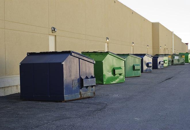 industrial garbage dumpsters filled with discarded materials in Bethany